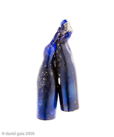 blue and black burnt artifact