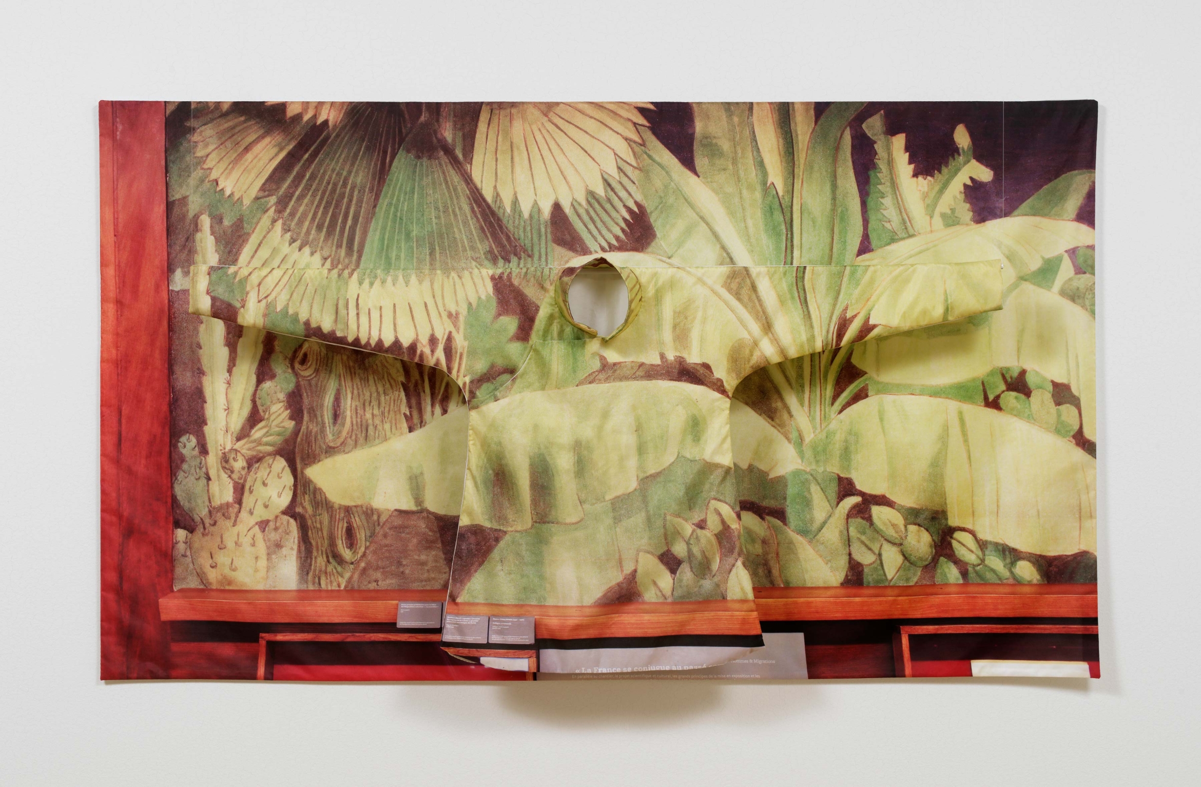 green leafy photograph on silk with warm orange border