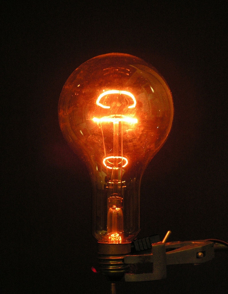 photo of lit lightbulb