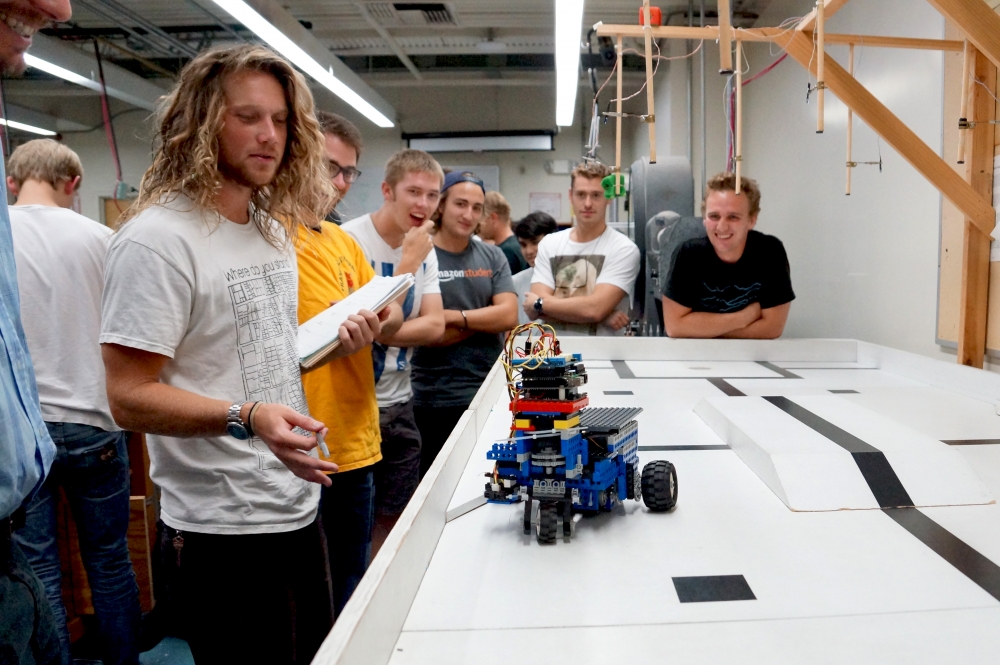 UCSB mechanical engineering students testing a robot 