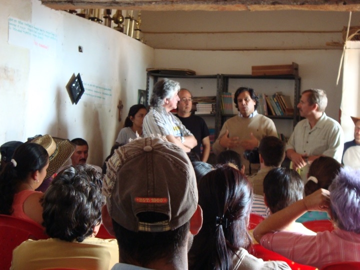 researchers talking to local residents in Colombia