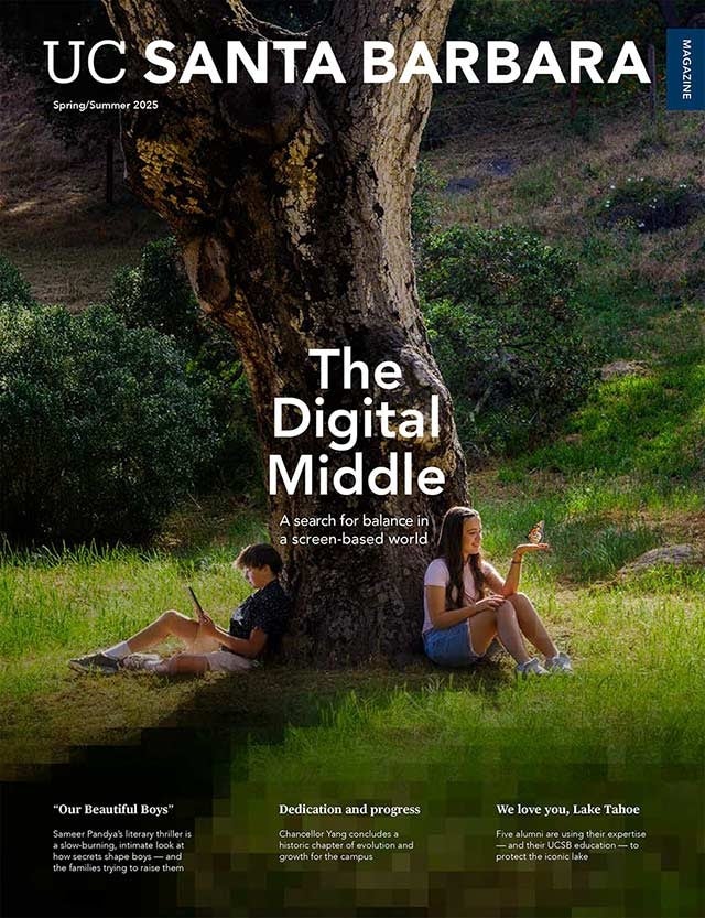 cover of the latest issue with two children sitting on either side of a tree, one holding a phone the other holding a butterfly