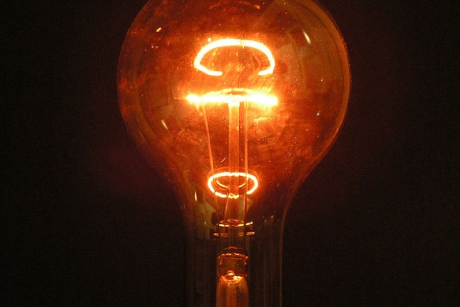 photo of lit lightbulb
